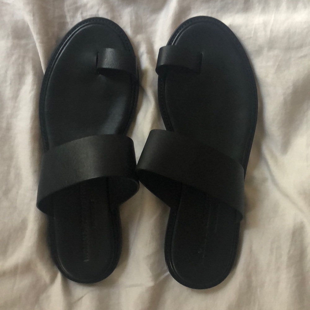 Black common projects sandals
